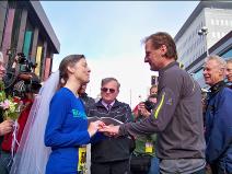 Ralph Fishburn, of Ralph's Regal Weddings,  performing a wedding for a Kent, Washington couple at the start line of Bloomsday Race in Spokane Washington-first one ever!