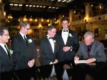 Ralph Fishburn, of Ralph's Regal Weddings, performing wedding fora same-sex couple at The Davenport Hotel, Spokane, Washington.