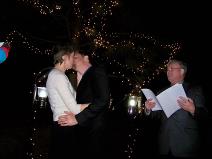 Ralph Fishburn, of Ralph's Regal Weddings, performing wedding at a private home, Coeur d'Alene, Idaho